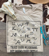 Load image into Gallery viewer, Trust Your Neighbors But Brand Your Cattle T-Shirt